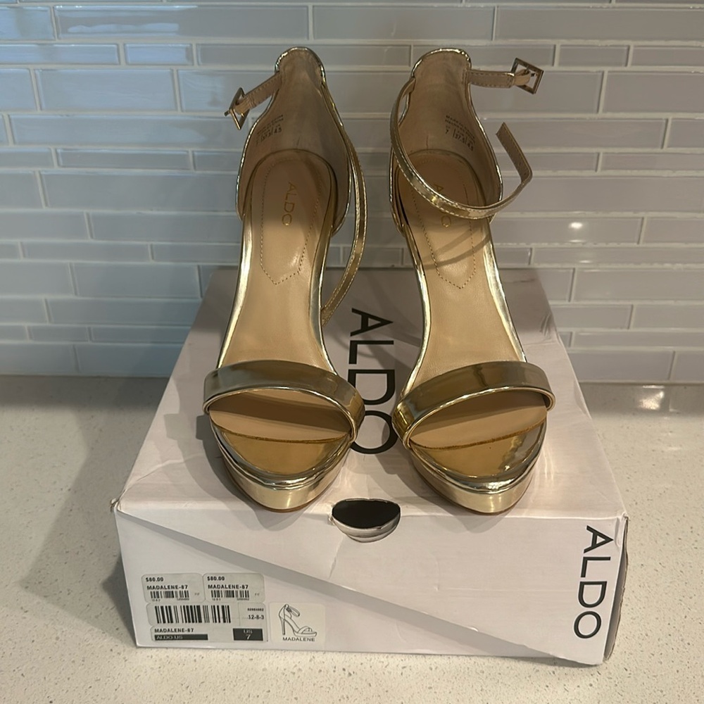 Gold high heels